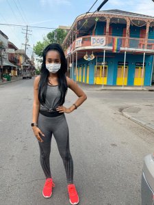 Destiny White in New Orleans wearing a face mask Home